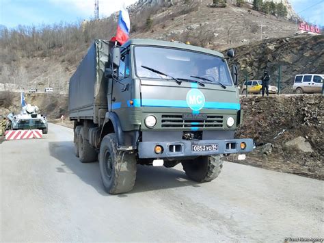 convoy  russian peacekeepers pass freely  azerbaijans lachin khankendi road