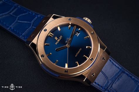 hands   hublot classic fusion king gold blue time  tide watches