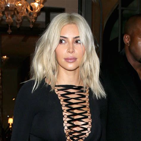 at last we know why kim kardashian dyed her hair bright blonde