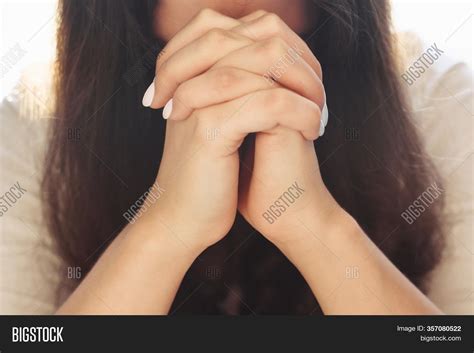 woman hands praying image photo  trial bigstock