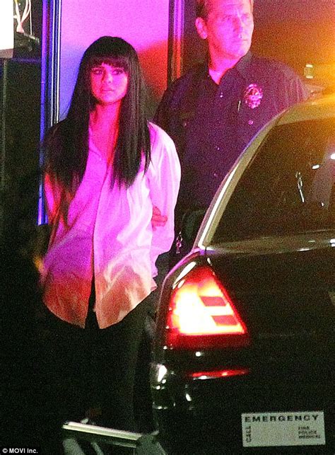 selena gomez is handcuffed by police on set of new music video daily