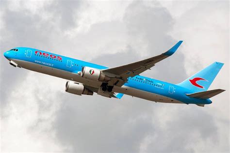 neos airline launches   stop flight  amritsar  toronto  milan travelobiz