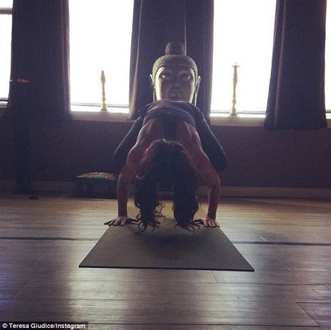 Teresa Giudice Does Yoga Pose On Front Of Statue Before
