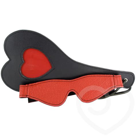 bondage boutique leather blindfold and heart shaped spanking paddle