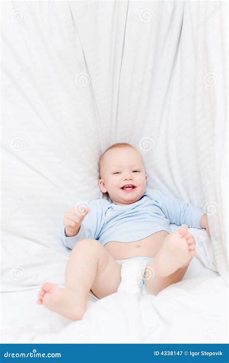 joyful baby fall  bed stock image image  child healthcare