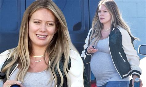 heavily pregnant hilary duff looks glowing as she steps out in gray t