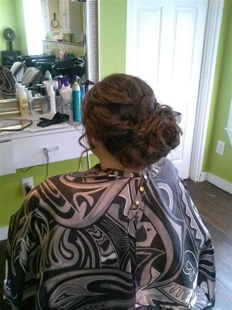 curly messy bun with side braid special occasion