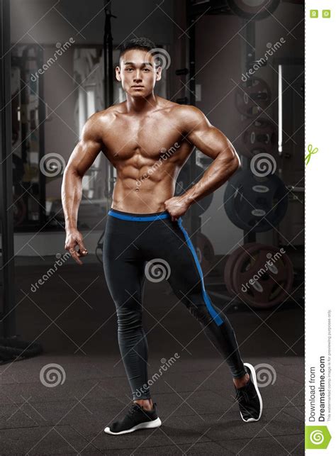 Asian Muscular Man Posing In Gym Shaped Abdominal Strong