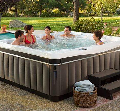backyard leisure  create  oasis   family hot tubs spas