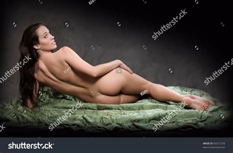 Posing for erotic photos