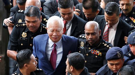 malaysia s ex leader najib razak is charged in corruption inquiry