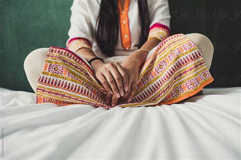 Indian Woman Sitting On Bed By Stocksy Contributor Lumina Stocksy