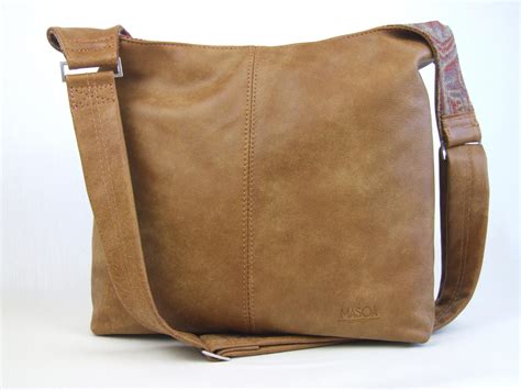 soft tan leather purse  art  mike mignola