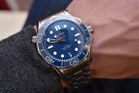 hands  omega seamaster diver  master chronometer baselworld  specs price