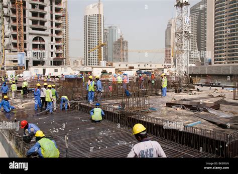 indian migrant workers   construction site  dubai stock photo alamy