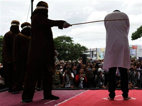 indonesian christians publicly caned for violating sharia law breitbart