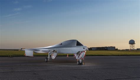 bae  combat drone  aid fighter pilots  oust  bloomberg