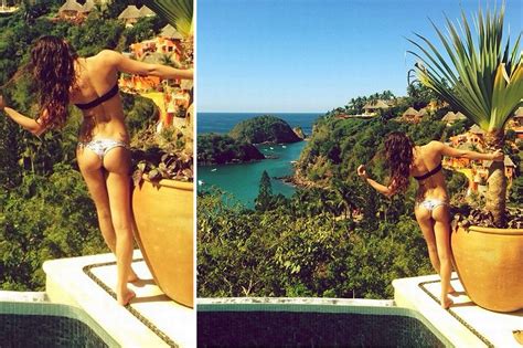 jessie j shows off her toned legs and hot lips as she frolics in the sand during exotic january