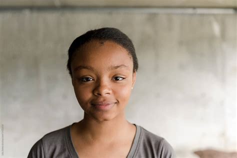 portrait of happy black teen girl by stocksy contributor léa jones