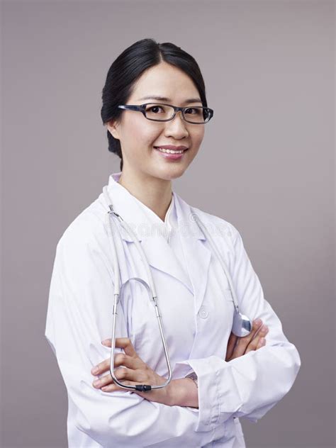 Asian Doctor Woman Or Nurse Giving Flu Or Antiviral Vaccine To Little