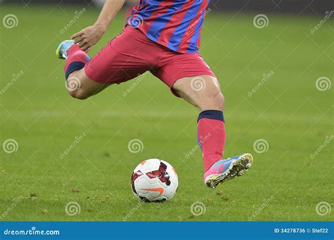 football soccer match  player shooting ball  goal royalty  stock photography
