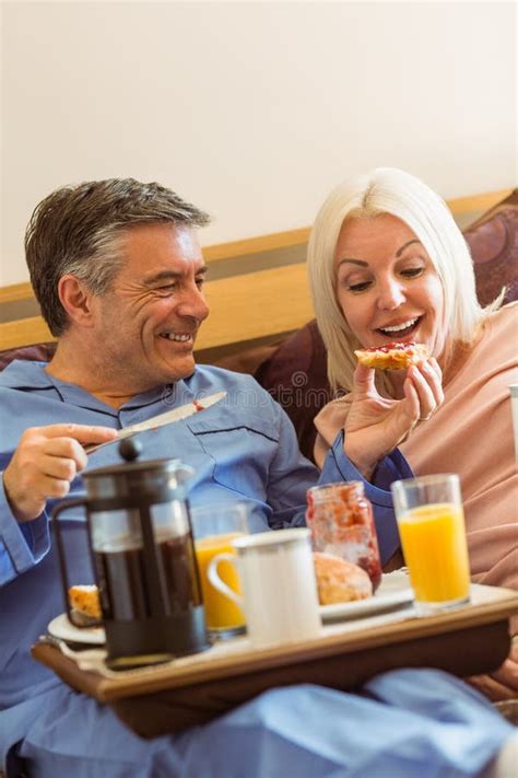 Happy Mature Couple Having Breakfast In Bed Stock Image Image Of
