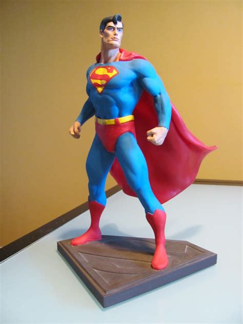 clint carsons collectibles graphitti designs superman statue
