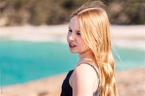 pre teenage girl playing at the beach albany western australia by