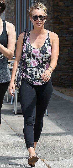 Kaley Cuoco Shows Off Slim Figure In A Floral Shirt And Leggings
