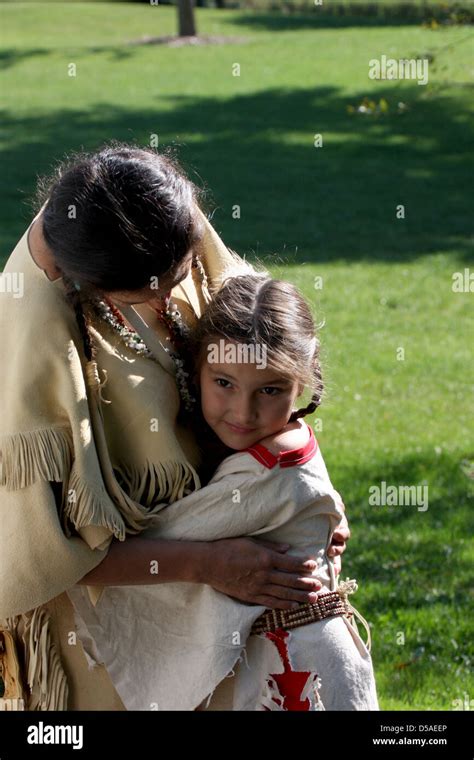 Native American Indian Lakota Sioux Mother Hugging Her Daughter Stock