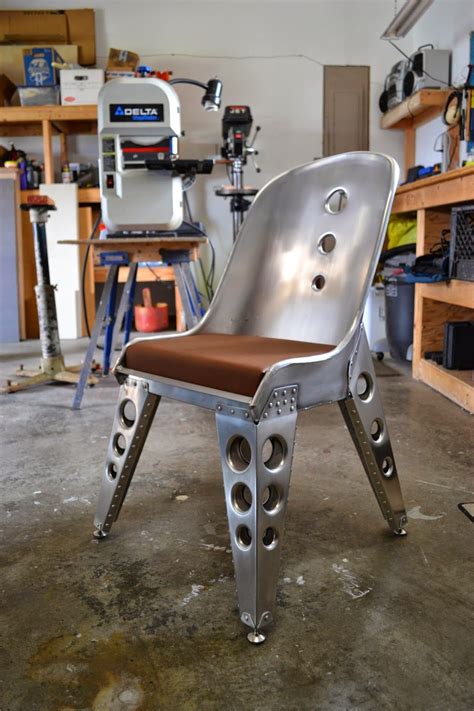 aviation inspired aluminum riveted bomber seat chair