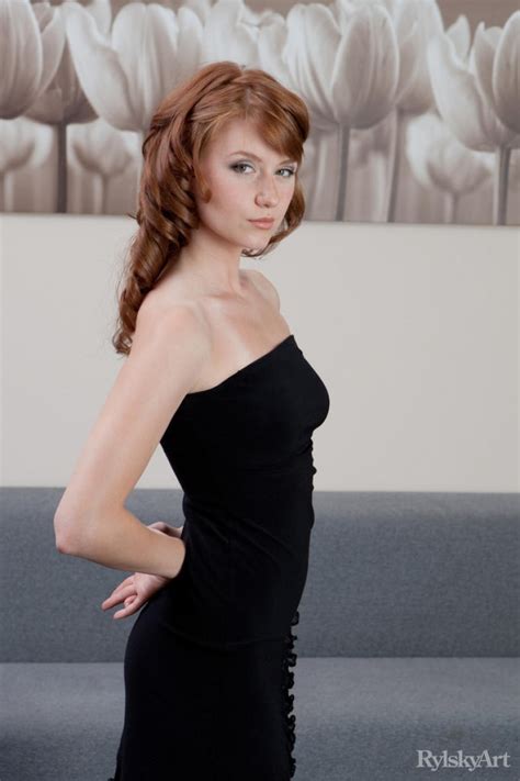 Sexy Redhead In A Tight Black Dress