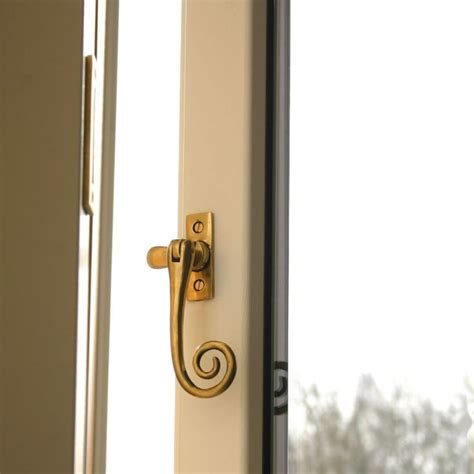 anvil  polished brass monkeytail window fastener window fasteners