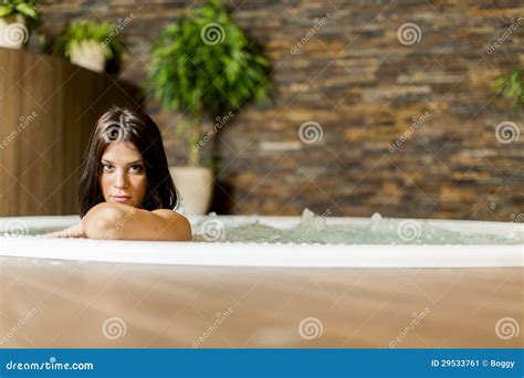 Young Woman Relaxing In The Hot Tub Stock Image Image Of Body