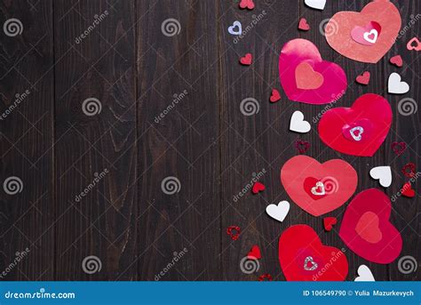 border  red paper hearts  wooden background stock photo image