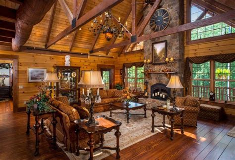 brown living room ceiling wood beams custom log home high