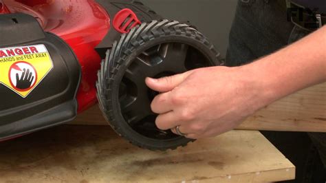 troy bilt lawn mower repair   replace  front wheel youtube