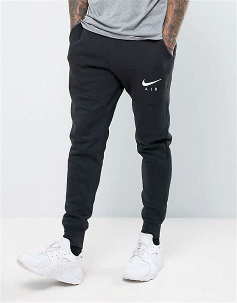 nike nike air joggers in tapered fit in black 832152 010