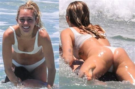 miley cyrus fat ass in a thong bikini at the beach