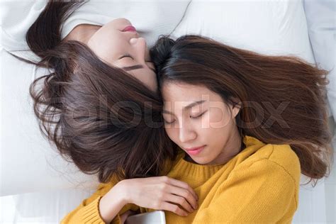Asia Lesbian Lgbt Couple Lay On Bed And Close Eye With Happiness Moment