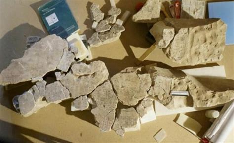 spanish archaeologists try to reconstruct fragments of the