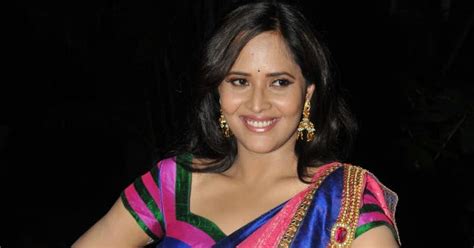 indian tv actress anchor anasuya latest images in pink saree tollywood stars