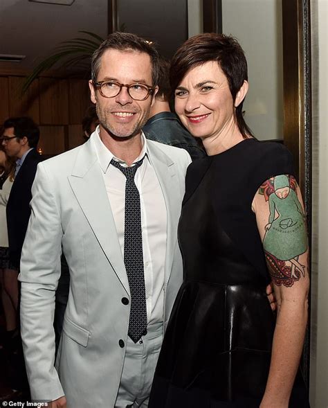 neighbours star guy pearce 52 show off his handsome good looks during