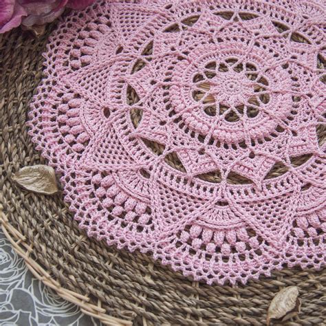 textured crochet doily  intricate details  pattern  written