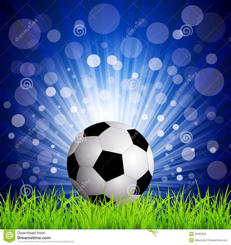 Soccer Football On Grass On A Blue Background Stock
