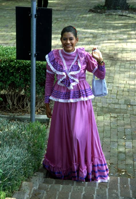[unidentified Woman In Traditional Mexican Dress] The Portal To Texas