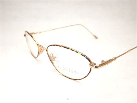 oval womens eyeglasses tortoise shell and gold metal vintage