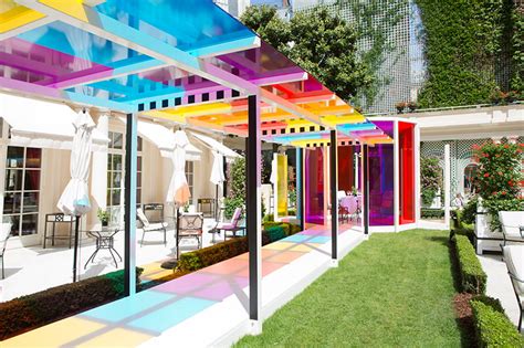daniel buren creates  chromatic landscape   gardens  hotel le bristol paris
