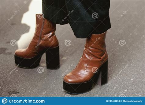 woman wearing brown leather platform shoes  black leather skirt stock photo image  model