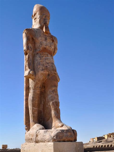 archaeologists unveil restored statue of pharaoh amenhotep iii after